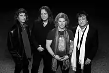 Group photo of the Babys in 2013.