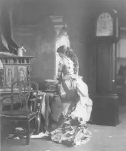 "Sarony's Centennial Tableaux", showing young woman making U.S. Flag on sewing machine, c1876