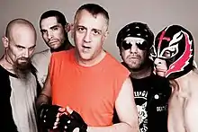 The Dwarves in 2017; left to right: Rex Everything, "Hunter Down" Martinez, Blag Dahlia, Fresh Prince of Darkness, and HeWhoCannotBeNamed