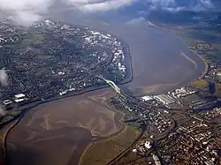 Aerial views of the Silver Jubilee Bridge and the two towns of Runcorn (left) and Widnes (right)
