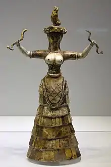 "Snake Goddess" figurine; 1460-1410 BC (from the Minoan Neo-palatial Period); faience; height: 29.5&nbsp;cm; from the Temple Repository at Knossos; Heraklion Archaeological Museum