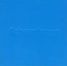 A blue cover with the word "Adventures" embossed.