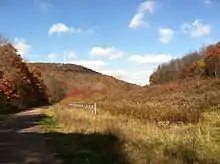 The Great Allegheny Passage in fall view of wind turbines