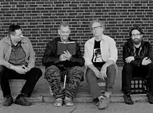 (L–R): Andrew Klimeyk, John D Morton, Craig Willis Bell, and Matthew Albert Harris