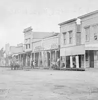 Businesses on Third Street, between Utah and Oregon (now Santa Monica Blvd.), 1880.