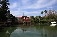 View of the entrance of Thiruvangad temple adjacent to the chira(pond)