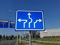 Throughabout road sign in the Netherlands .mw-parser-output .geo-default,.mw-parser-output .geo-dms,.mw-parser-output .geo-dec{display:inline}.mw-parser-output .geo-nondefault,.mw-parser-output .geo-multi-punct{display:none}.mw-parser-output .longitude,.mw-parser-output .latitude{white-space:nowrap}51°51′02″N 5°49′54″E﻿ / ﻿51.850517°N 5.831576°E﻿ / 51.850517; 5.831576