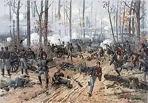 Soldiers fighting in a smokey woods