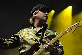 Heidecker with a guitar