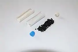 Disassembled smoking pipe filter. 9&nbsp;mm charcoal. One-sided.