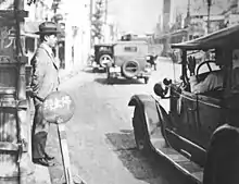 Image 25A Tokyo taxi driver indicating a fare of 50 Sen by holding up five fingers, in 1932. (from Transport in Greater Tokyo)