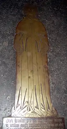 Arthur Vernon, priest and son of Anne Talbot and Henry Vernon, in the robes of a University of Cambridge MA, on his tomb in the floor of the Golden Chapel at Tong.
