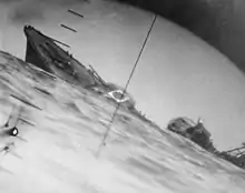 Torpedoed Japanese destroyer Yamakaze photographed through periscope of USS&nbsp;Nautilus, 25 June 1942.