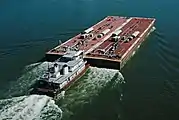 Towboat Ben McCool upbound on Ohio River at Matthew E. Welsh Bridge with two tank barges (5 of 6), near Mauckport, Indiana, USA, 1987