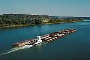 Towboat Dakota Storm upbound on Ohio River at Matthew E. Welsh Bridge (4 of 4), near Mauckport, Indiana, USA, 1987
