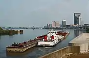 Towboat Valvoline upbound with empty tank barges in Portland Canal, Louisville, Kentucky, USA, 1987