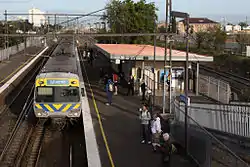 Westbound view of the now demolished station, with a Comeng train arriving on Platform 1, in September 2010
