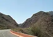 The largest road cut on Transmountain Drive, at the mile-high crest of Smuggler's Pass