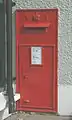 Royal Mail Victorian wallbox in front wall of main building