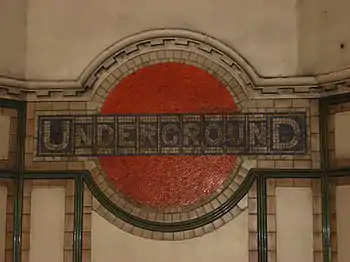 Image 19Early style tube roundel in mosaic at Maida Vale Underground station.