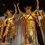 Statue of Mārīcī (right) as one of the Twenty-Four Protective Deities in Jade Buddha Temple, Shanghai, China