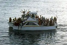 An overloaded boat of Marielitos in Key West.