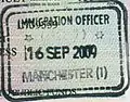 Passport stamp issued at Manchester Airport (Terminal 1) to a visa national.