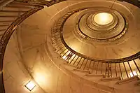 One of two self-supporting spiral staircases in Alabama marble.