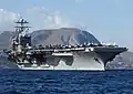 The American aircraft carrier USS Harry S. Truman (CVN-75) sails out of the Souda Bay harbor in Crete, Greece, following a four-day port visit to Greece's largest island.