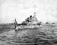 Oregon seen from behind, several other ships are visible in the background