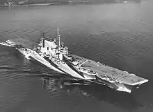 Black and white aerial photo of a warship