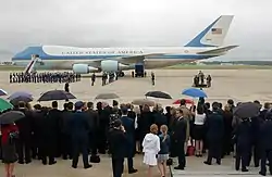 Crowds gather at Andrews AFB during 2004 to pay respect for former President Ronald Reagan, with a Boeing VC-25A, believed to be SAM 29000, of the 89th Airlift Wing in the background.