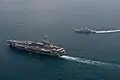 USS John C. Stennis and RSS Stalwart underway on 30 January 2012.