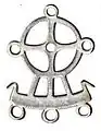 Metal pendant with sun-bird-ship motif, France