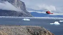 Air Greenland Bell 212 approaches Uummannaq Heliport over Assorput Strait