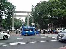 A gaisensha driving around the street at the Yasukuni Shrine on August 15, the V-J Day.