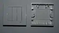ψ-way light switch with fitting box