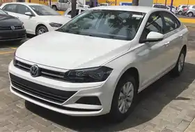  Front-three-quarter view of a four-door car with flush headlamps.