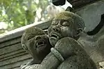 “Vampire Children” statuary adorning the Dalem Agung Padangtegal Temple
