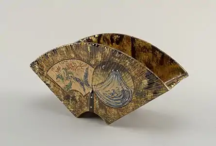 Faience or earthenware vase with two feet, with mountain night scene on the back and a floral daylight scene with butterfly on the front, by Émile Gallé (1884–85)