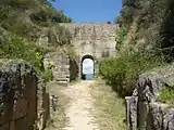 The Porta Rosa (Pink Gate, but Rosa, here, is intended as a given name), made of dry masonry of sandstone bricks, a rare exemplar of a Greek arch, circa 4th century BC