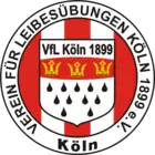 a red and white circular logo, around which is the written the full name of the club, in the centre is a shield which resembles the coat of arms of Cologne with the words "VfL Koln 1899" at the top