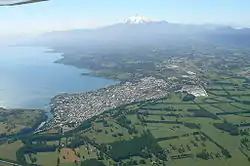 Route 199-CH runs across the city of Villarrica and goes then eastward (up in the photo) along Villarrica Lake