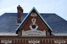 The town hall and school in Villers-Carbonnel