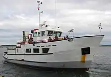 The passenger ferry MV William G Ernst, departing the dock at Chester bound for Big Tancook Island and Little Tancook Island. The ferry is operated by the provincial Department of Transportation and Infrastructure Renewal.