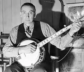 Wade Ward in 1937 holding a 4-string banjo