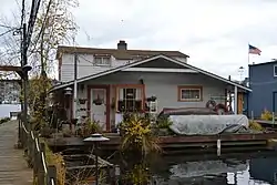 The NRHP-listed Wagner Houseboat, home of Dick Wagner, former president of the Floating Homes Association and founder of the Center for Wooden Boats.