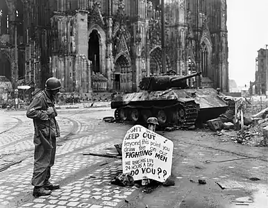 US soldier and destroyed Panther tank, 4 April 1945.