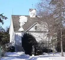 Wood-frame building with few windows