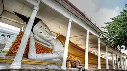 The ancient reclining Buddha statue of Wat Ku